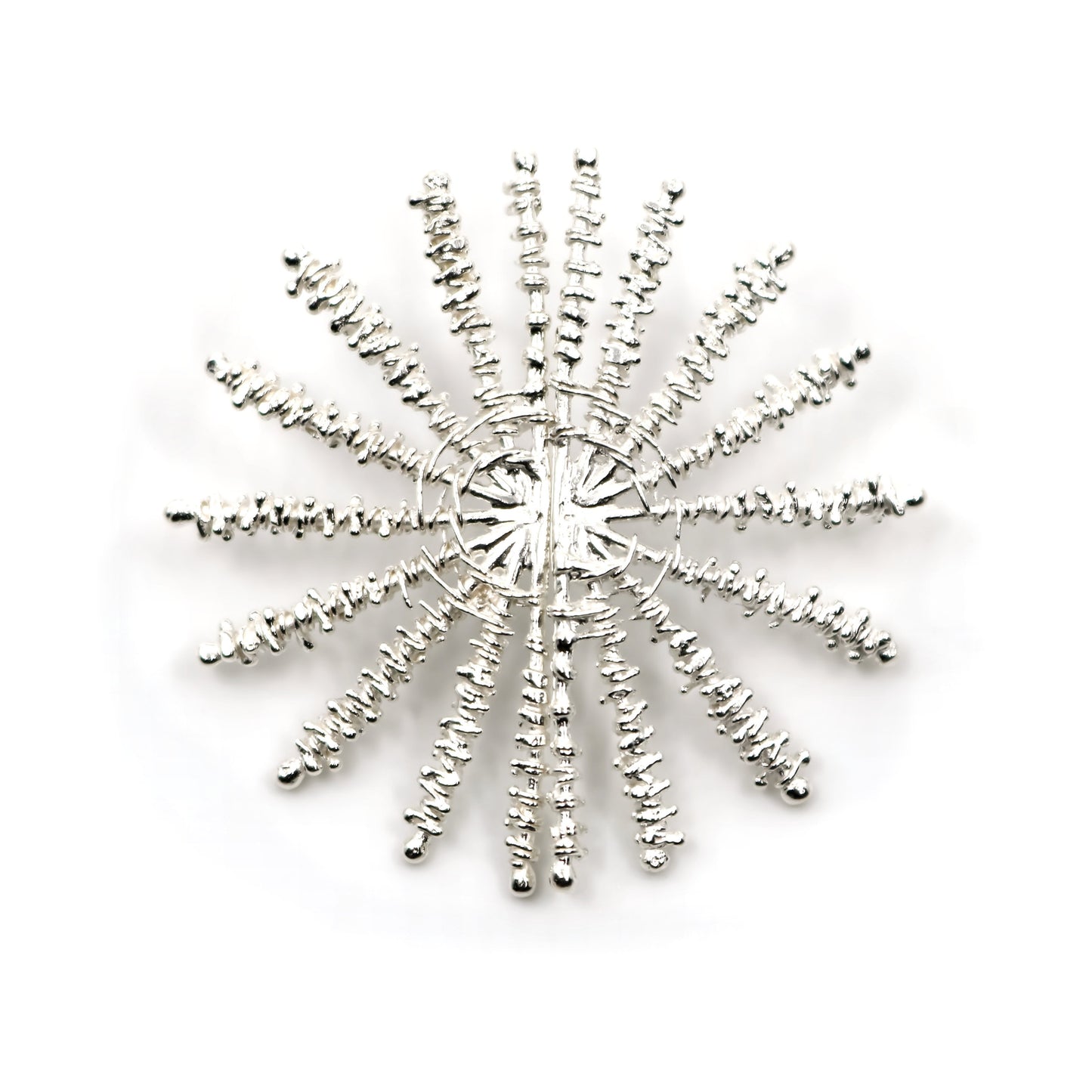 Decorative silver earring on white background