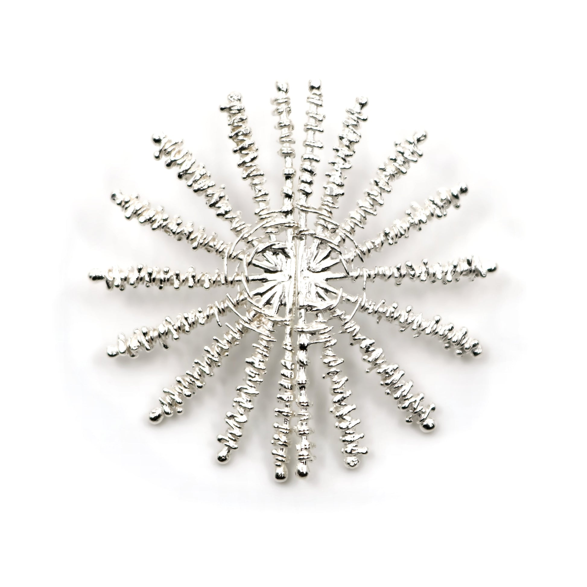Decorative silver earring on white background
