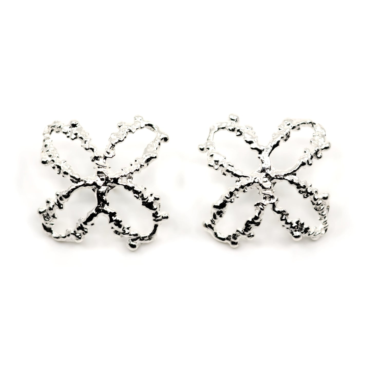 Pair of silver 4 petal flower earrings on a white background