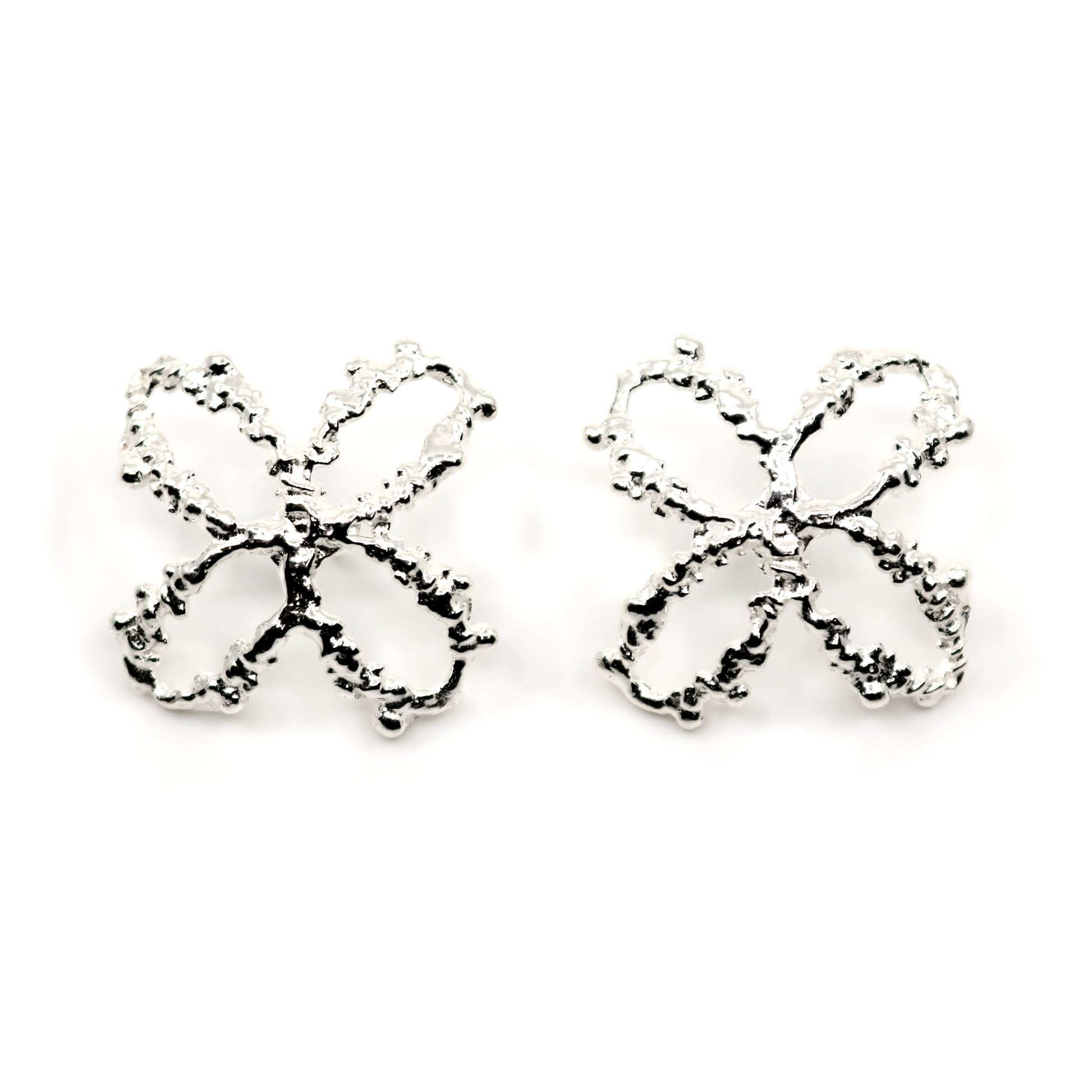 Pair of silver 4 petal flower earrings on a white background